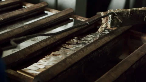 4K Close-Up of Aluminum Casting Molds, Metal Ingots, Recycling Solidification Stock Footage 294680877