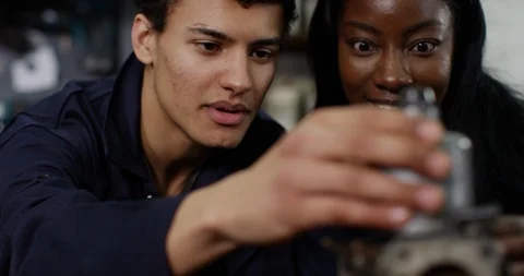 4K Close up college students in engineering class working on a project together Stock Footage 113110615