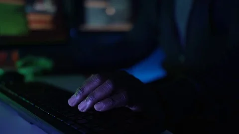 4K Close up computer hacker trying to break a code on computer system Stock Footage 73381845