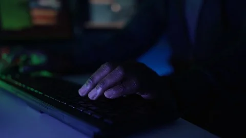 4K Close up computer hacker trying to break a code on computer system Stock Footage 73381960