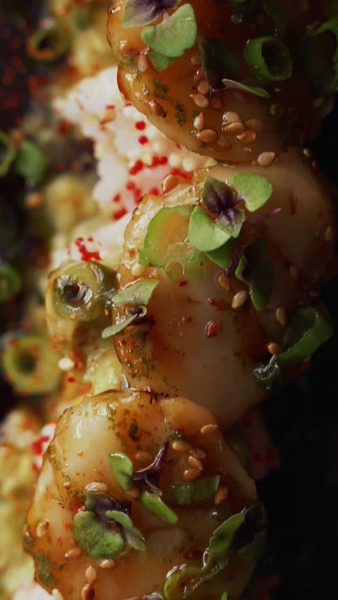 4K close up creative scallop sushi roll sliding table - cinematic vertical video Stock Footage 315123125