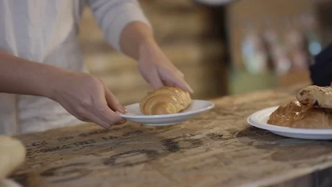 4K Close up of customer making contactless payment with smartphone in a cafe Stock Footage 76678067