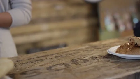 4K Close up of customer making contactless payment with smartphone in a cafe Stock Footage 76678092