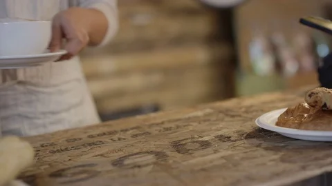 4K Close up of customer making contactless payment with smartphone in a cafe Stock Footage 76679038