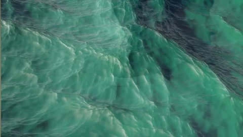 4K Close-up of Deep Teal and Turquoise Water with Surface Ripples Stock Footage 328536337