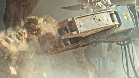4K Close Up Demolition Excavator Attachment Breaking Through Brick Wall Stock Footage 328535950