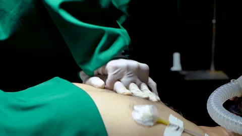 4K, Close-up doctor's hand, pumping hear... | Stock Video | Pond5