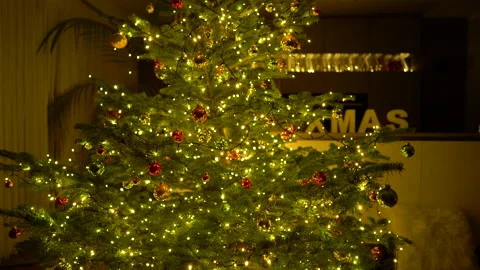 4k close dolly move out and in at illuminated christmas tree at home Stock Footage 144179661