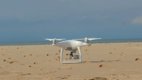 4k close up of drone preparing for fly on the beach Video stock 83924578