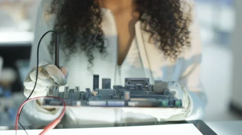 4K Close up electronics engineer working in lab building &amp; testing motherboard.  Stock Footage 66434811