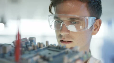 4K Close up electronics engineer working in lab building &amp; testing motherboard.  Stock Footage 66435711
