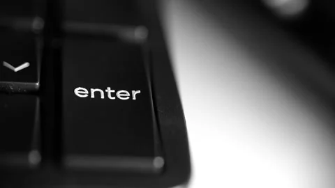 4K close-up of an Enter key on a computer keyboard Stock Footage 325366013