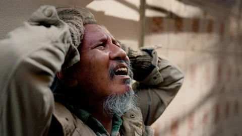 4k, Close Up The face of a dirty-dressed, long-haired, long-haired old man, Stock Footage 205440599
