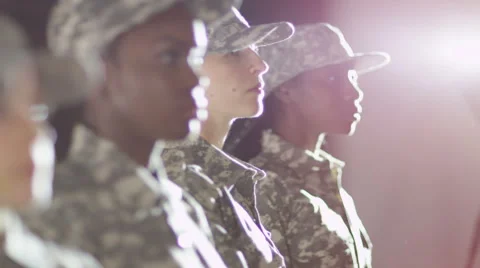 4K Close up on faces of mixed ethnicity female soldiers  Stock Footage