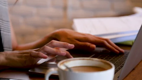4k close up female hands typing keyboard in cafe shop, small business owner.. Stock Footage 247006628