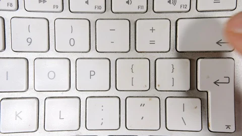 4K close up of fingers typing backspace and deleting work, working computer Stock Footage 88230111