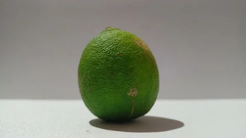 4K: Close-Up of a Fresh Green Lime Stock Footage 206178140