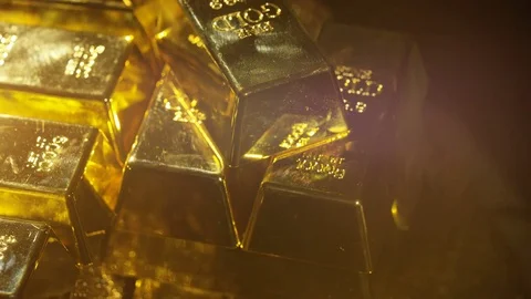 4K Close up gold bars on shimmering rotating stand, wealth &amp; luxury concept. Stock Footage 72610564