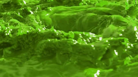 4K Close up of green paint or toxic liquid splashing animated loop. Stock Footage 41871646