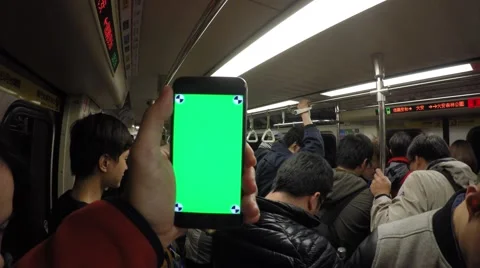 4K, Close Up of Green Screen phone, Man Using Smartphone in Train-Dan Stock Footage 61007978