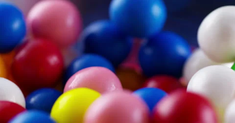 4k Close Up of Gum Balls Rotating in a Jar Stock Footage 35514611