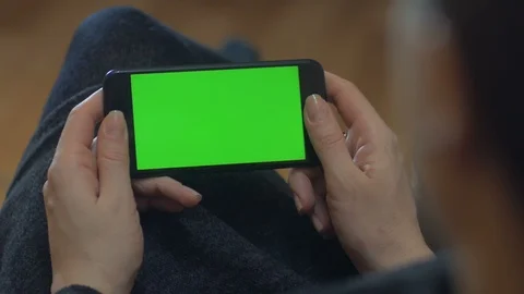4K Close Up Of Hand Using A Smartphone With Green Screen Stock Footage 102653460