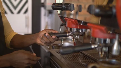 4K Close up hands of Barista makes up espresso in coffee shop. Stockbeeldmateriaal 111339677