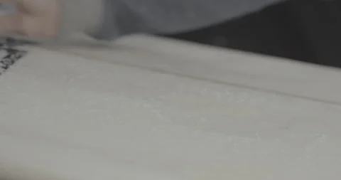 4K close up of hands sanding surfboard surface, Peniche, Portugal Stock Footage 159821628