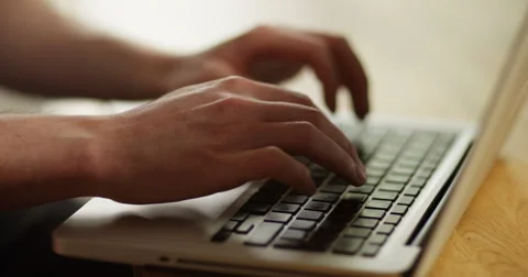 4k, Close-up of hands typing on a laptop keyboard. Video stock 65757221