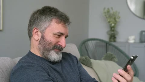 4k Close Up Of Handsome Beard Man Grey Haired Is Having A Life Video Chat Video stock 153805613