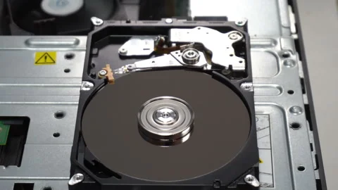 4K Close up of a hard disk drive reading and writing data Stock Footage 151612722