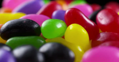 4K Close Up of Jelly Beans Rotating in a Jar Stock Footage 35514594