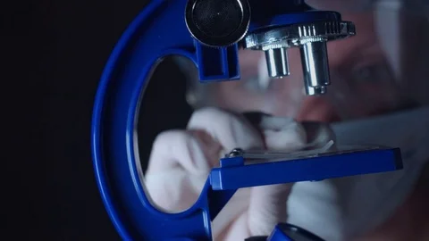 4K Close-Up Lab Scientist with a Microscope Video stock 73057323