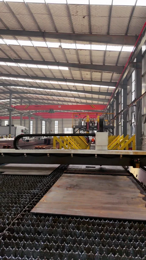 4K Close Up of Laser Cutting Machine Cutting Metal Sheet in Factory Stock Footage 335793412
