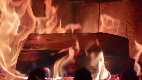 4K Close Up of Log Burning in Fireplace, Intense Flames and Embers, Cozy Indoor  Stock Footage 336560676