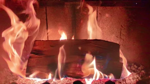 4K Close Up of Log Burning, Intense Fire Flames and Embers, Warm Campfire Gl Stock Footage 334102166