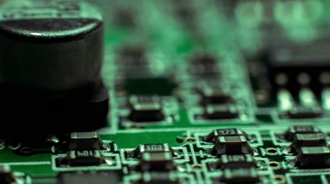 4K close up macro computer chips circuits surface rotating dolly Stock Footage