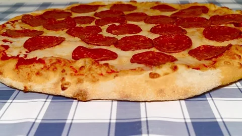4K close-up macro view of fresh crispy cheesy pepperoni pizza golden crust .. Stock Footage 318251749