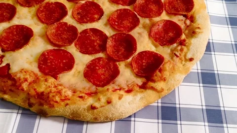 4K close-up macro view of fresh crispy cheesy pepperoni pizza golden crust .. Stock Footage 318251811