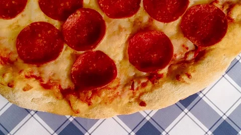 4K close-up macro view of fresh crispy cheesy pepperoni pizza golden crust .. Stock Footage 318251946