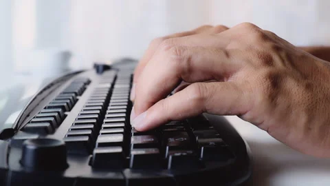 4K Close up Man hands type ona keyboard working at home. Hands touch typing k Stock Footage 154728419