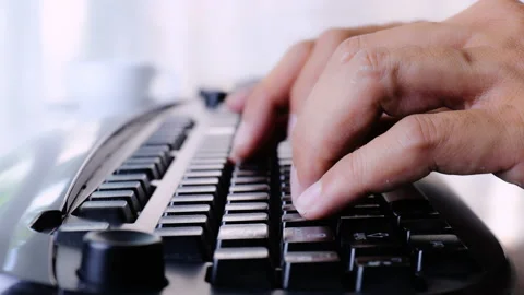 4K Close up Man hands type ona keyboard working at home. Hands touch typing k Stock Footage 154728605
