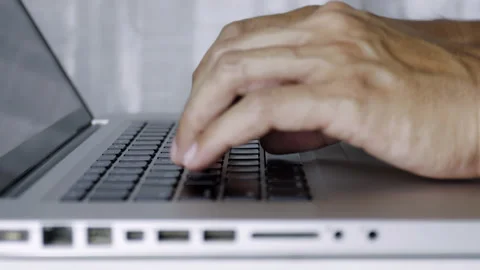 4K Close up Man hands type on laptop keyboard working at home. Hands touch ty Stock Footage 154738906