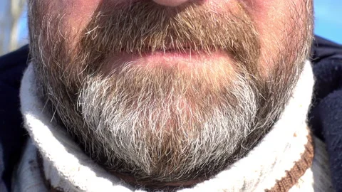4K Close-up of man wearing a bearded man smiling. Stock Footage 85483864