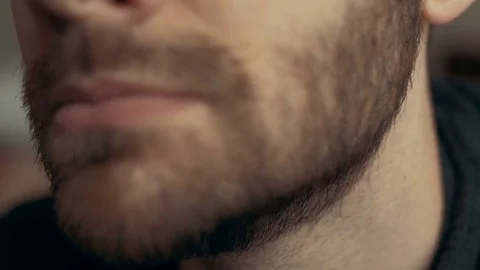 4k - Close up of a man's jaw Video stock 70596899