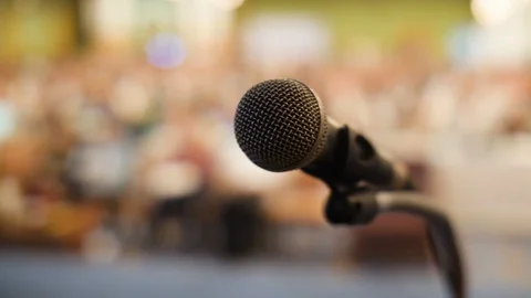 4K Close up of Microphone on stage in auditorium, Slow motion shot Stock Footage 91388563