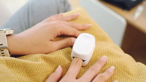 4K Close-up Mini UV LED Nail Lamp Clipped to Finger Drying Polish Stock Footage 330481065