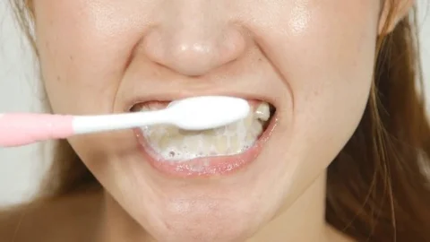 4k close up of mouth brushing teeth Stock-Footage 73240679