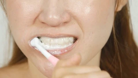 4k close up of mouth brushing teeth Video stock 73240775