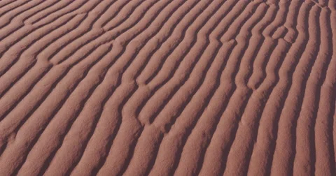 4K close-up panning shot of ripples in the sand dunes in Namibia Stock Footage 64696956